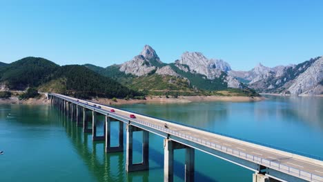 Drone-View-of-the-Bridge-Riaño-in-the-foreground-and-the-background-mountains