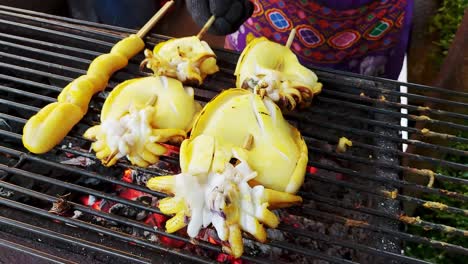 Fresh-grilled-squid-on-a-coal-stove-seafood-grilled-Thai-street-food