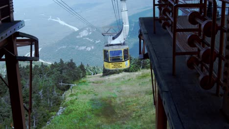An-aerial-tram-ascends-up-a-cable-towards-the-camera