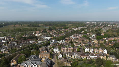 Living-suburbs-of-London-city,-aerial-orbit-view