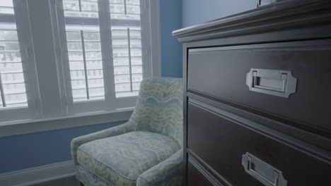 Interior-shot-bedside-press-gimbal-towards-armchair
