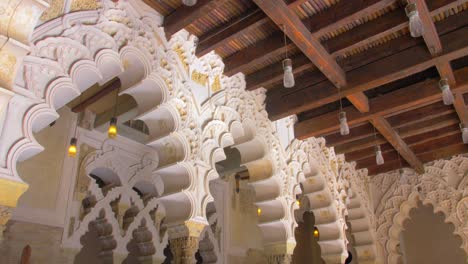 Decorative-Arches-In-Moorish-Taifa-North-Side-Hall-Inside-Aljaferia-Palace-In-Zaragoza,-Aragon,-Spain