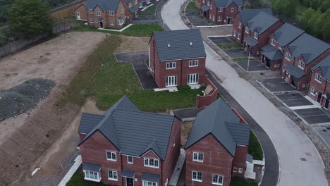 New-beginnings-incomplete-real-estate-neighbourhood-housing-construction-site-aerial-view