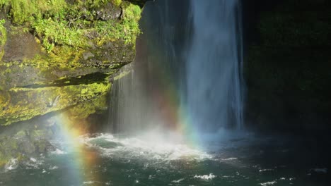 Spectacular-Icelandic-Gluggafoss-Waterfall-and-colorful-Rainbow-reflecting-in-sunlight---Medium-shot