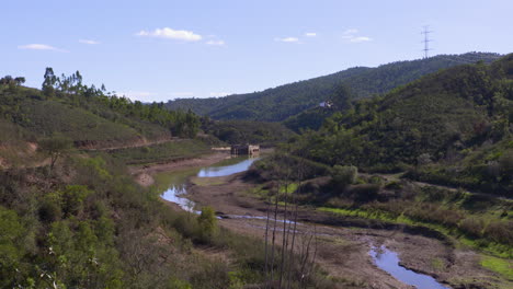 old-house-floods-when-the-water-basin-rises-in-the-mountains-of-silves-natural-park