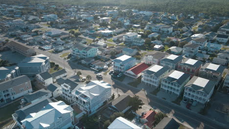 Wide-aerial-over-Kure-Beach-apartment-properties-Establishing-aerial-view-4K