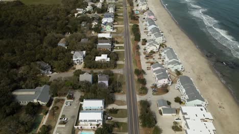 Flying-over-street-by-seaside-Kure-beach-North-Carolina