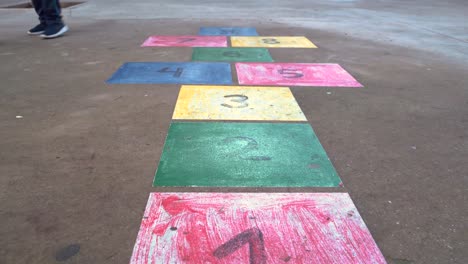 Hopscotch-Game---Numbers-With-Colors-Painted-On-The-Floor