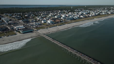 Kure-Beach-pier-aerial-view-reveal-town-4K