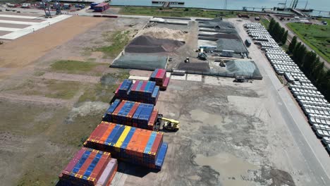 Containers-stacked-London-Thamesport-river-Medway-Kent-UK-drone-aerial-view