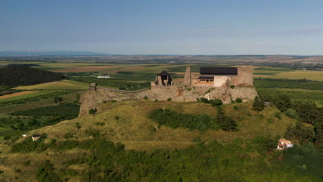 Wide-drone-footage-of-Boldogkō-Castle-on-Lion's-Rock-in-Hungary
