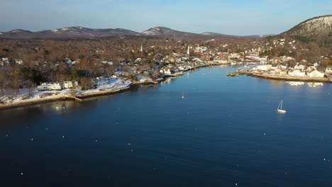 Aerial-footage-flying-towards-a-quiet-Camden-Harbor-on-a-cold-winter-morning