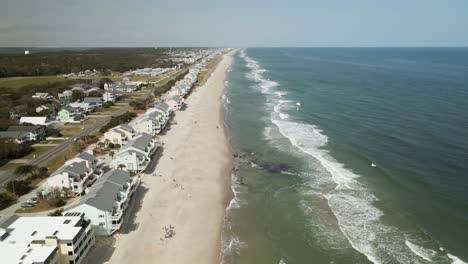 Beautiful-scenic-aerial-view-flying-over-Kure-Beach-North-Carolina