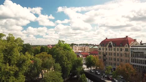 Ascending-Aerial-4k-view-of-Swedish-city-Orebro,-summer-in-Sweden