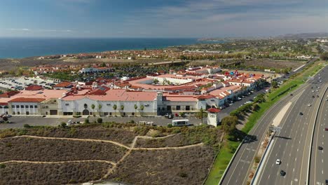 Aerial-view-of-the-San-Clemente-outlets-mall-along-side-the-five-freeway-in-California