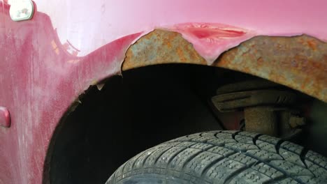 Rusted-wheel-rear-ends-during-rains-of-a-hatchback-car