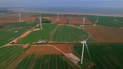 Wind-generators-at-Lissett-airfield-along-coast,-Yorkshire-in-UK