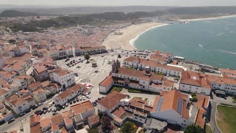 Cityscape-of-Nazare-and-beach-in-background,-Portugal