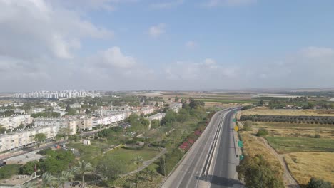 aerial-shot-above-a-traffic-at-netivot-city,-israel