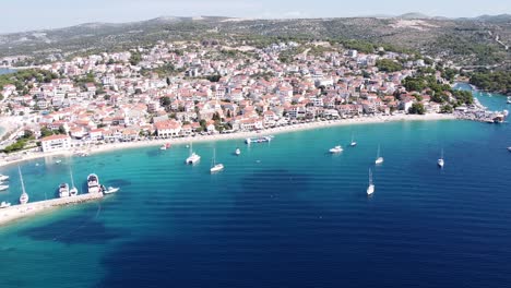 Primosten,-Dalmatia,-Croatia---Aerial-Drone-View-of-Beaches,-Sail-Boats,-Village-and-Coastline