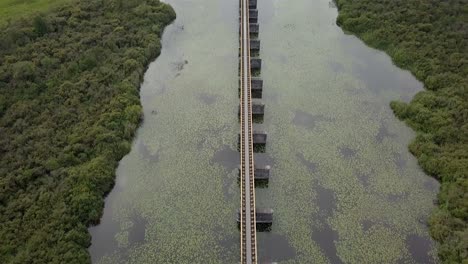 Aerial-drone-view-of-the-historic-railroad-bridge-Moerputtenbrug-in-the-Netherlands,-Europe