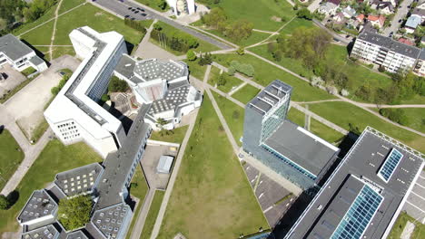Modern-student-campus-and-university-buildings-of-KTU-in-Kaunas-city,-aerial-orbit-view