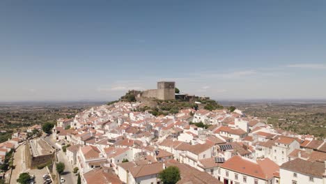 Aerial-orbiting-over-Castelo-de-vide-white-houses-village,-hilltop-Castle---Alentejo