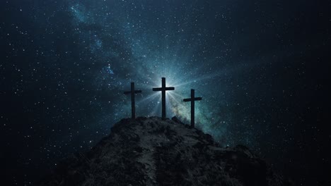 4k-three-crosses-silhouette-over-mountains-milky-way-background
