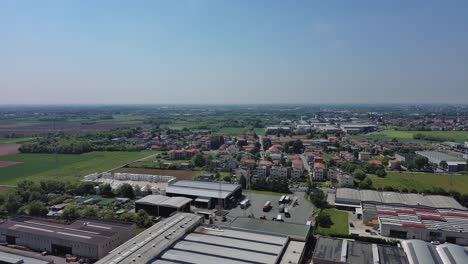 Aerial-of-Arcore-Monza-Brianza-cityscape-with-factory-buildings-and-countryside