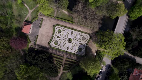 Vintage-Design-of-Altes-Teehaus-Garden-in-Schloss-Wolfsburg,-Aerial-top-down-rotating-View