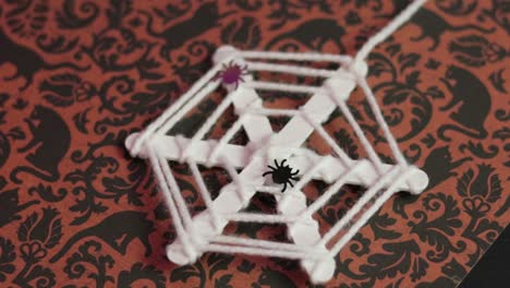 Halloween-ornament.-Spiderweb-made-of-stamen-thread.-Steadycam