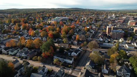 Concord,-Capital-City-of-New-Hampshire-USA,-Establishing-Drone-Aerial-View-of-Central-Neighborhood-and-Colorful-Tree-Foliage-on-Sunny-Autumn-Day