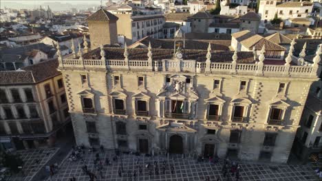 Aerial-circle-view-of-the-main-façade-of-the-Cathedral-of-Granada-with-people-in-front