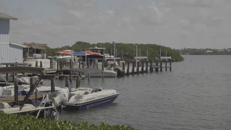 Footage-of-a-boat-dock-in-a-calm-harbor-on-a-beautiful-sunny-day
