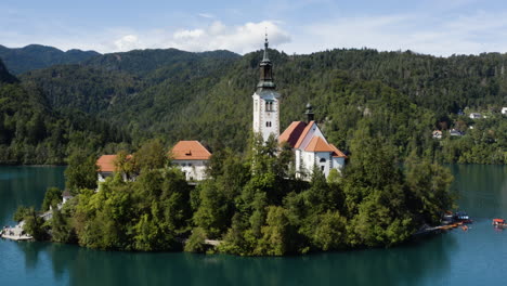 Assumption-of-Mary-Pilgrimage-Church-in-the-middle-of-Lake-Bled-Slovenia---drone-shot
