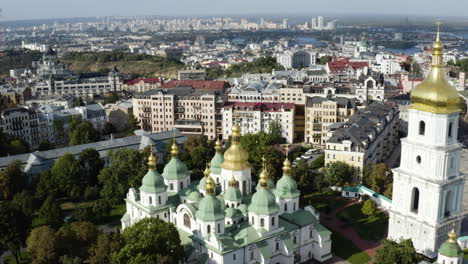 Saint-Sophia-Cathedral-With-Cityscape-In-Background-In-Kiev,-Ukraine---aerial-drone-shot