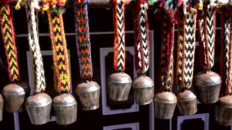 Some-yak-bells-hanging-in-a-line-waiting-for-someone-to-buy-them