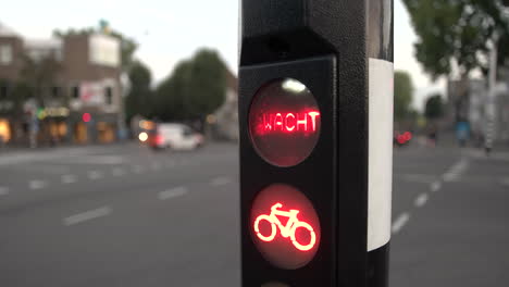 Red-LED-Bicycle-Traffic-Signal-Light-In-The-Street-In-Gouda-City-Center,-Netherlands