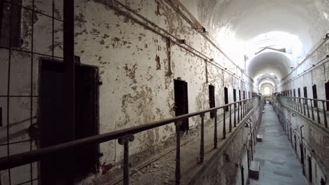 Pan-from-left-side-of-corridor-to-view-down-center-of-cellblock-at-Eastern-State-Penitentiary