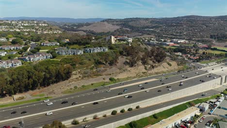 Aerial-view-of-Cliff-side-housing-over-the-five-freeway-in-San-Clemente,-California