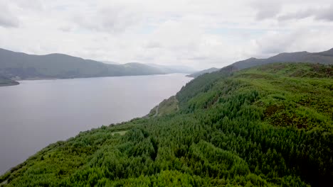 Loch-Linnhe-surrounded-by-green-coniferous-hills,-Scotland