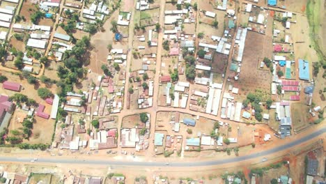urban-setting-with-unassuming-buildings-and-poor-roads-in-Kenya,-Africa