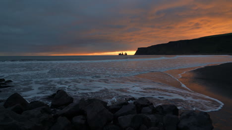 Scenic-Sunset-From-The-Beach-With-Black-Sand-Near-Vík,-South-Iceland---wide-static-shot