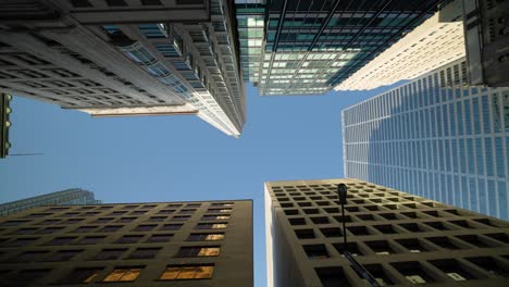 Looking-up-at-tall-modern-architecture-office-buildings-in-Downtown-Toronto-Financial-District