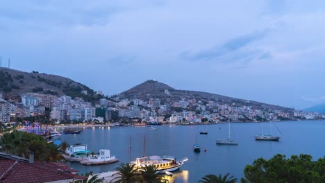Stunning-day-to-night-time-lapse-over-vibrant-Mediterranean-bay-city