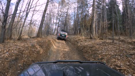 4x4-cars-riding-through-the-muddy-forest---GoPro-4k-window-view