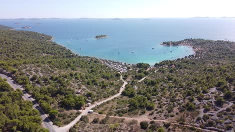 Kosirina-Beach,-Bay-and-Campsite-at-Murter-Kornati-Island,-Dalmatia,-Croatia---Aerial-Drone-View