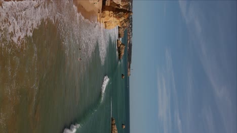Vertical-slow-motion-view-of-rugged-and-scenic-coastline-of-Southern-Portugal-near-Lagos
