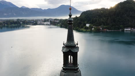 Aerial-View-On-Calm-Waters-Of-Lake-Bled-In-The-Julian-Alps,-Slovenia---drone-shot
