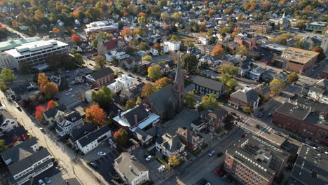 Aerial-View-of-Concord,-New-Hampshire-USA,-Downtown-Neighborhood,-South-Church,-Streets,-Houses-and-Colorful-Trees-on-Sunny-Autumn-Day